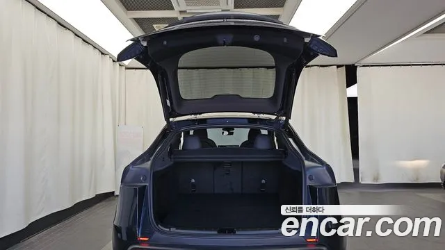 Tesla Model Y — Фото автомобиля 26