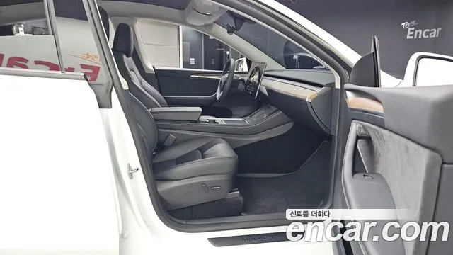 Tesla Model Y — Фото автомобиля 26