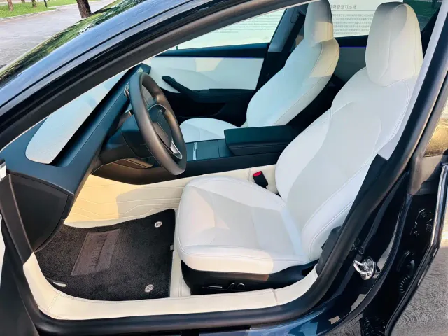 Tesla Model 3 — Фото автомобиля 12