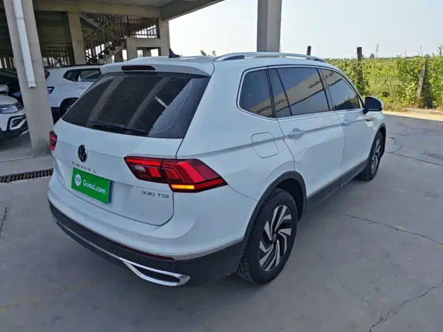 Volkswagen Tiguan L — Фото автомобиля 6