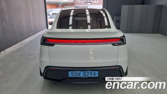 Tesla Model Y — Фото автомобиля 4