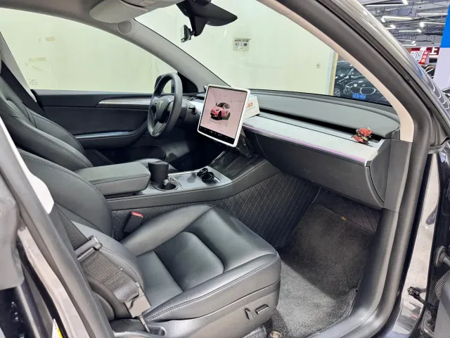 Tesla Model Y — Фото автомобиля 7