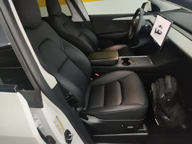 Tesla Model Y — Фото автомобиля 24