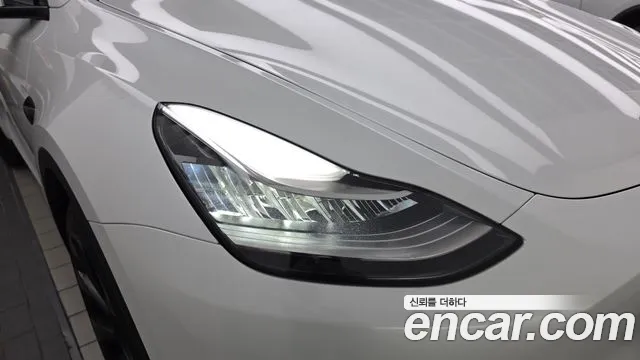 Tesla Model Y — Фото автомобиля 22