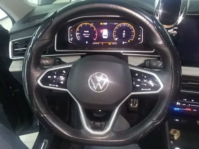 Volkswagen Tiguan L — Фото автомобиля 10