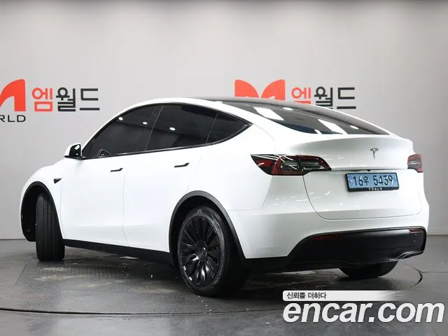 Tesla Model Y — Фото автомобиля 4