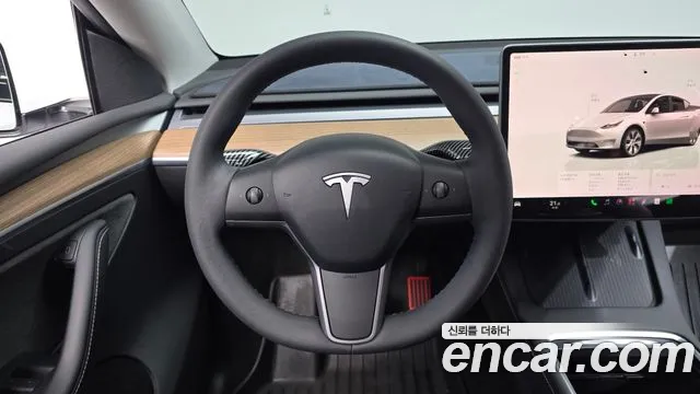 Tesla Model Y — Фото автомобиля 13