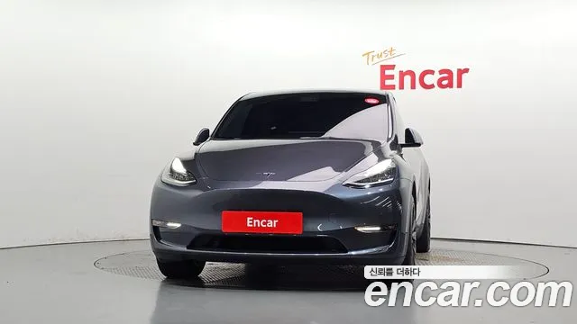 Tesla Model Y — Фото автомобиля 3