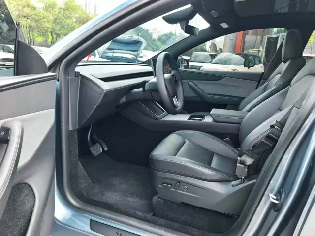 Tesla Model Y — Фото автомобиля 5