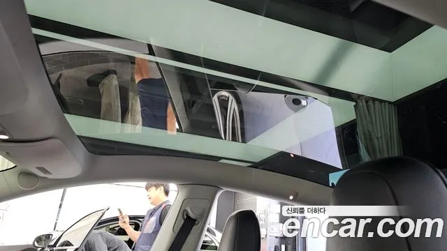 Tesla Model Y — Фото автомобиля 18