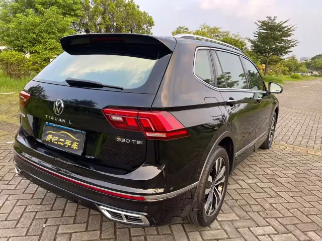 Volkswagen Tiguan L — Фото автомобиля 11