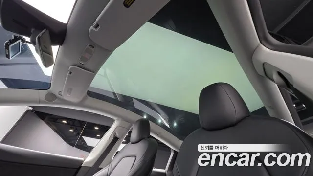 Tesla Model Y — Фото автомобиля 11