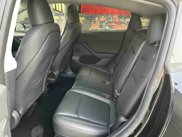 Tesla Model Y — Фото автомобиля 10