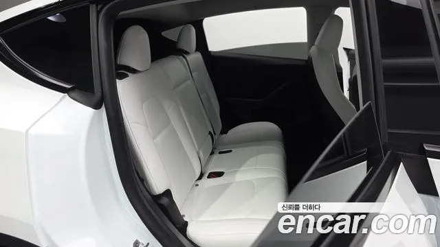 Tesla Model Y — Фото автомобиля 4