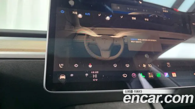 Tesla Model 3 — Фото автомобиля 30