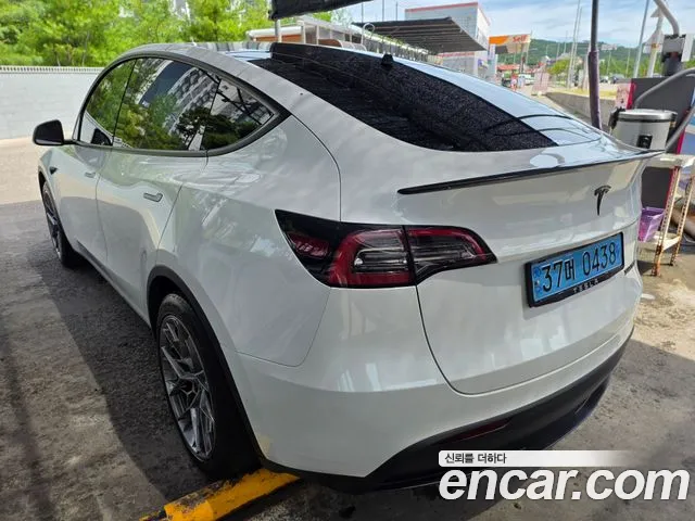 Tesla Model Y — Фото автомобиля 2