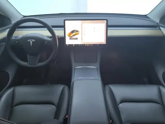 Tesla Model Y — Фото автомобиля 12