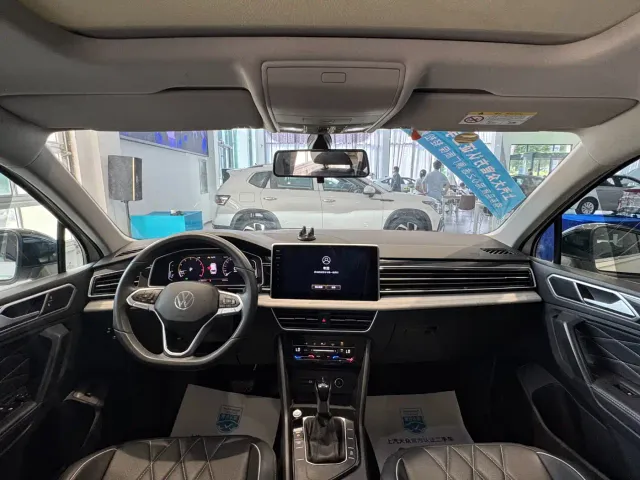 Volkswagen Tiguan L — Фото автомобиля 5