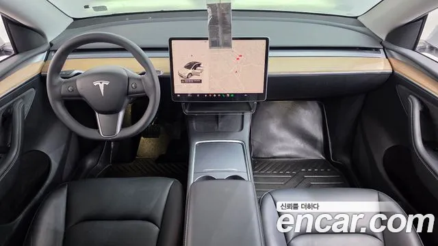 Tesla Model Y — Фото автомобиля 10