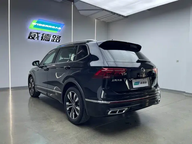 Volkswagen Tiguan L — Фото автомобиля 11