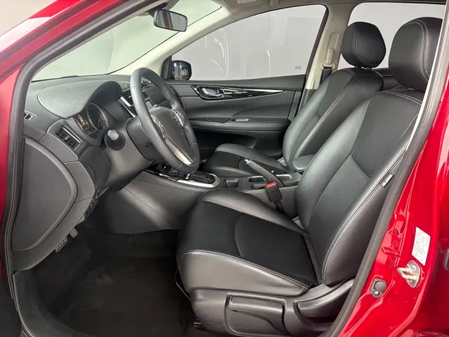 Nissan Tiida — Фото автомобиля 15