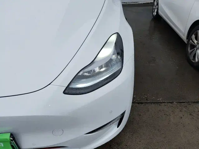 Tesla Model Y — Фото автомобиля 23