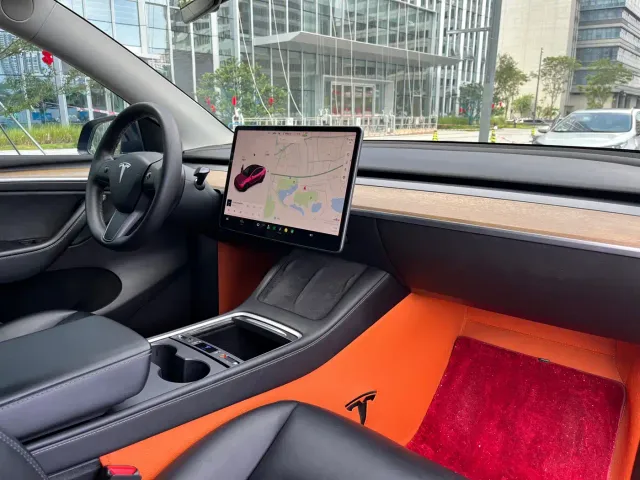 Tesla Model Y — Фото автомобиля 15