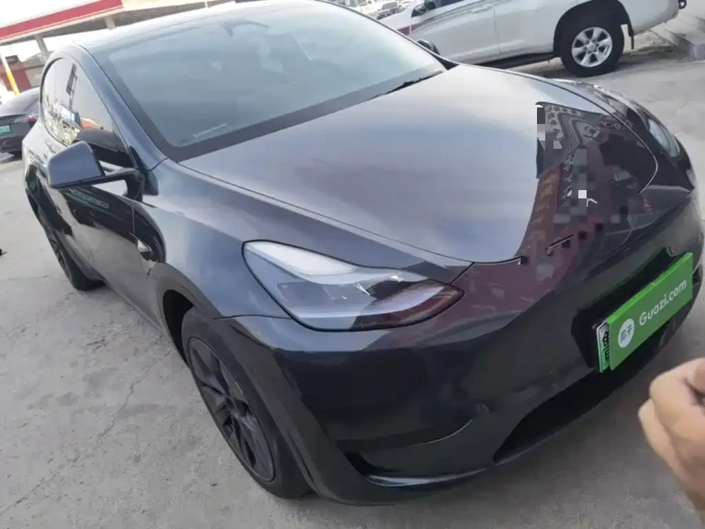 Tesla Model Y 2024 Rear-Wheel Drive Version — Фото автомобиля 3