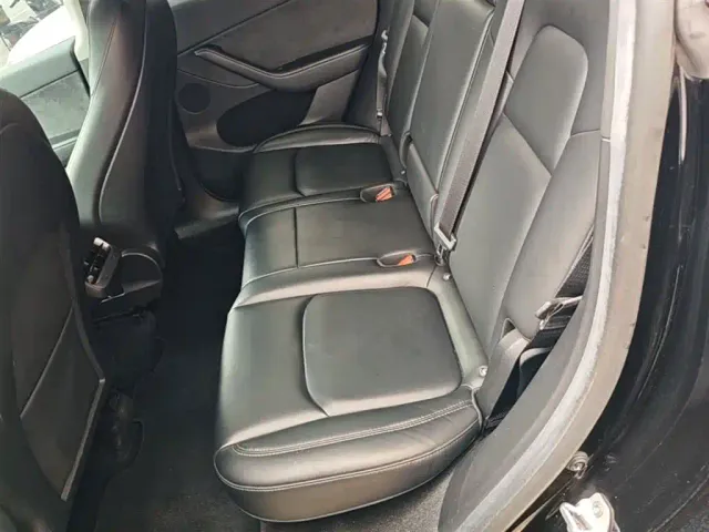 Tesla Model Y — Фото автомобиля 16