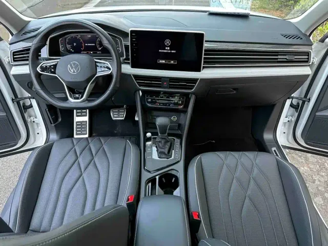 Volkswagen Tiguan L — Фото автомобиля 13