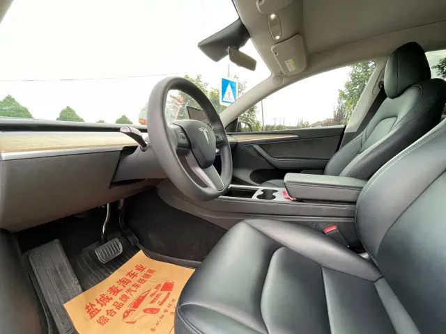Tesla Model Y — Фото автомобиля 8
