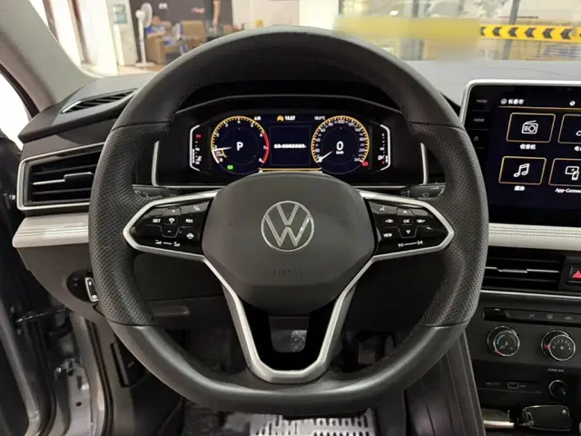 Volkswagen Tiguan L — Фото автомобиля 13