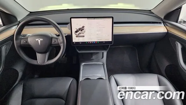 Tesla Model Y — Фото автомобиля 10
