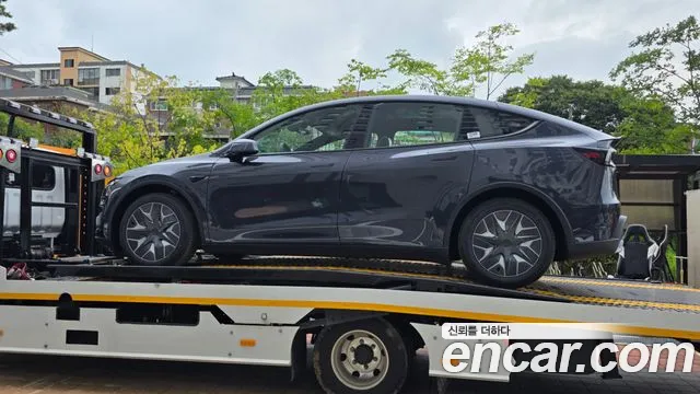 Tesla Model Y — Фото автомобиля 3