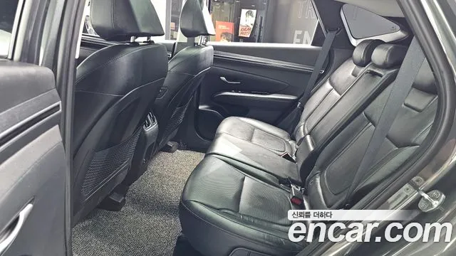 Hyundai Tucson Tucson (NX4) Бензин 1.6 Turbo 4WD — Фото автомобиля 24