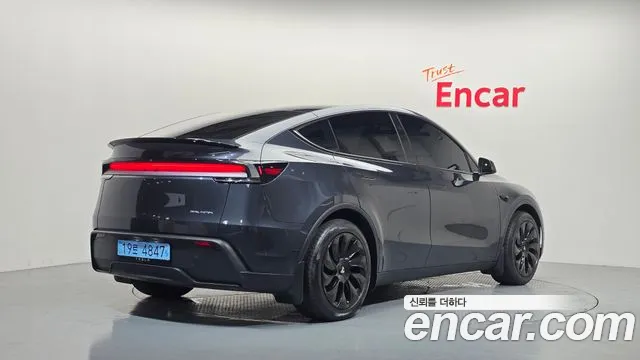 Tesla Model Y — Фото автомобиля 2