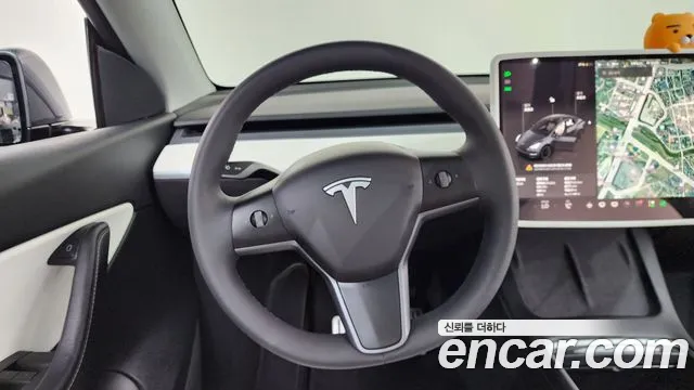 Tesla Model Y — Фото автомобиля 12