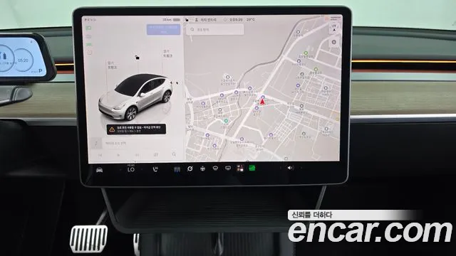 Tesla Model Y — Фото автомобиля 13