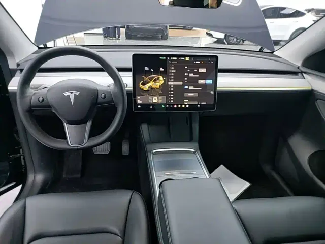 Tesla Model Y — Фото автомобиля 9