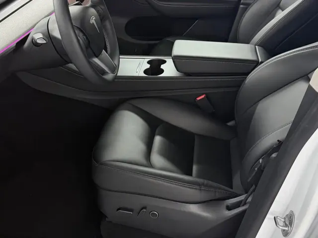 Tesla Model Y — Фото автомобиля 10