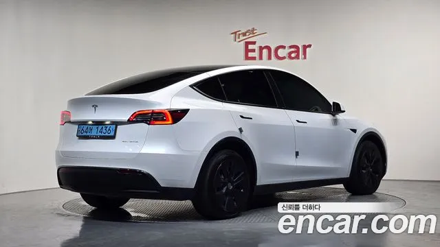 Tesla Model Y — Фото автомобиля 2