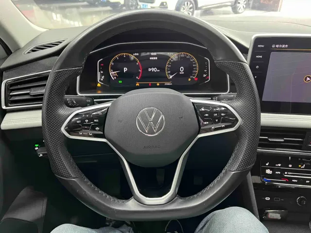 Volkswagen Tiguan L — Фото автомобиля 11