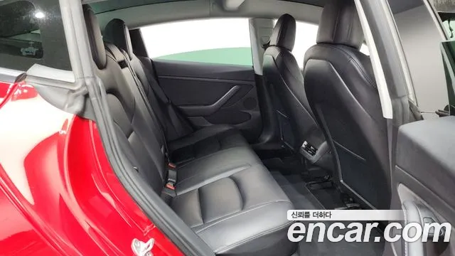 Tesla Model 3 — Фото автомобиля 12