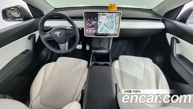Tesla Model Y — Фото автомобиля 6