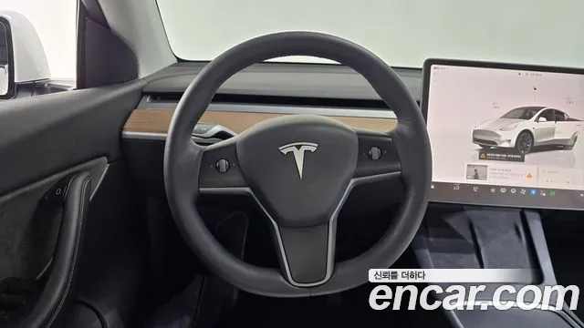 Tesla Model Y — Фото автомобиля 12