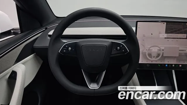Tesla Model Y — Фото автомобиля 12