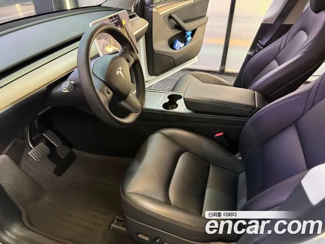 Tesla Model Y — Фото автомобиля 6