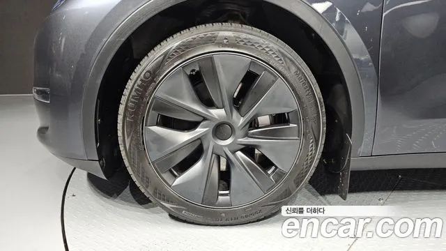 Tesla Model Y — Фото автомобиля 4