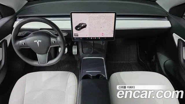 Tesla Model Y — Фото автомобиля 10