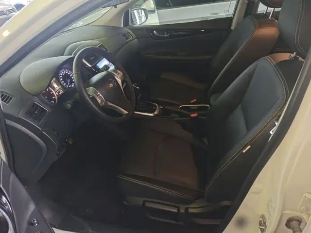 Nissan Tiida — Фото автомобиля 14